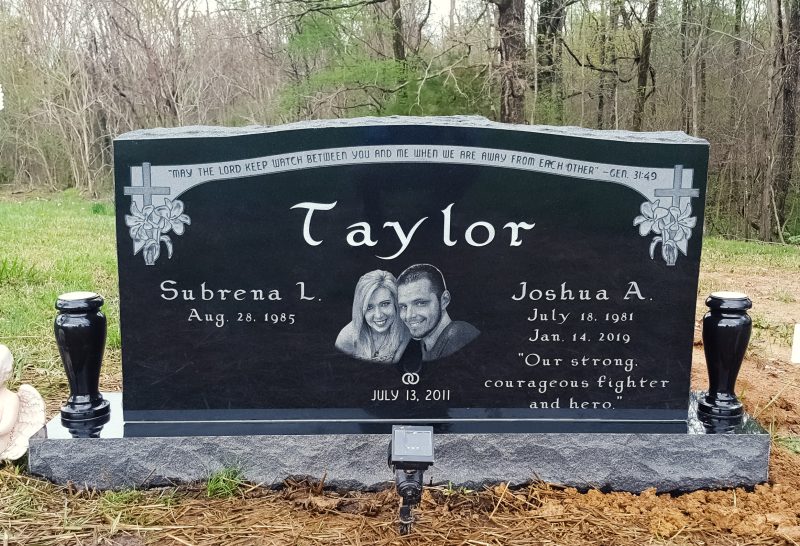 Taylor Black Granite Headstone with Couple Etching